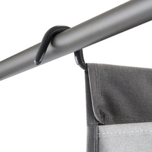 Curved handle bar and gray fabric bag edge on TRINITY laundry cart