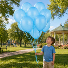 Cluster of electric blue latex balloons with visible strings