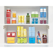 Clear plastic pantry storage bin set with side handles and front opening