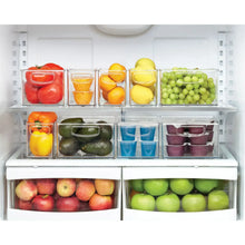 Kitchen pantry storage bins with clear bodies and colored cubes filled with produce