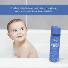 Baby vapor bath bottle beside smiling baby in a bathtub, blue 'Stuffy Nose & Cough' label