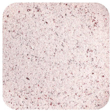 Pink and dark speckled supplement powder