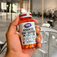 NOW Sports Advanced Joint Support supplement bottle held in hand, 60 capsules
