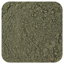 Super Greens green powder supplement, dense granular texture
