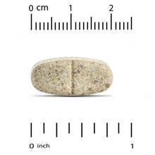 Single beige-gray plant-based supplement tablet with score line