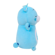 Blue plush bear toy side-back view with star patch and heart-shaped belly seam detail