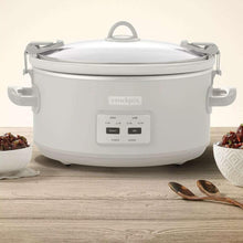 White 7-quart programmable slow cooker with lid and front control buttons