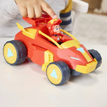 Close-up of red-and-yellow mech vehicle toy with seated figure in cockpit