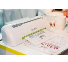Thermal laminator with green heat bar feeding documents