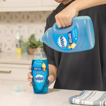 Blue Dawn dishwashing liquid bottle with 90 oz label, held by a person