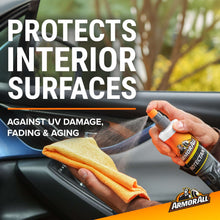 Interior surface protectant spray bottle with microfiber cloth for car detailing