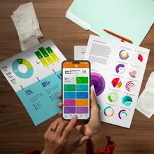 HP OfficeJet Pro 8138e printer app on smartphone, with printed charts on desk