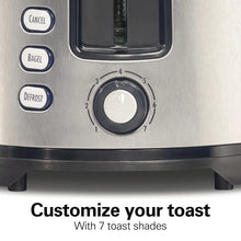 Toaster with toast shade dial and numbered setting marks
