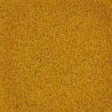 Ground curry powder, golden-brown spice texture