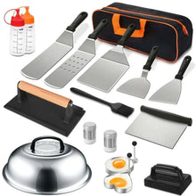 Stainless steel griddle accessory tools with black handles and storage pouch