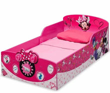 Pink Minnie Mouse toddler bed with wooden frame and decorative side rails