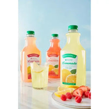 Assorted lemonade bottles with green caps, one bottle and cups with fruit