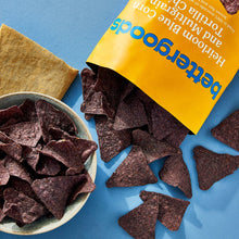 blue tortilla chips in bowl beside bettergoods bag