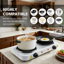 White portable electric hot plate with black coil burners, cooking pot and skillet