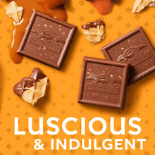 Milk chocolate square candies with caramel filling in a boxed arrangement