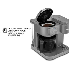 Moonlight grey Keurig coffee maker showing pod holder and brew basket