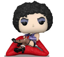 Funko Pop! vinyl figure with curly black hair, black boots, red cape, purple accents