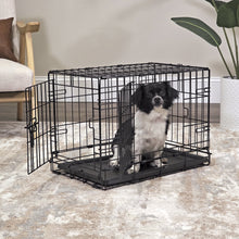 Foldable wire dog crate with leak-proof tray, with a standing dog inside