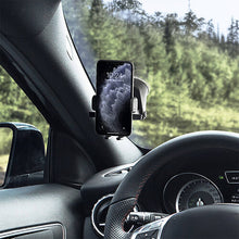 Universal phone holder clamp on car dashboard with dark mounting arms