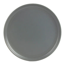 Matte gray stoneware dinner plate close-up with concentric rim lines