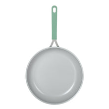 Gray interior ceramic nonstick fry pan with green handle
