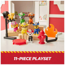 Fire rescue mission playset with multiple Paw Patrol dog figures and flame accessories