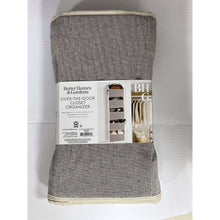 Gray over-the-door closet organizer with hooks, shown on retail package back