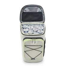 Soft cooler backpack open with ice inside and front insulated pocket