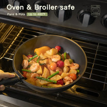 Black nonstick frying pan in an oven with food inside