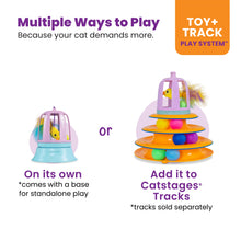 Purple and blue cat toy with clear dome top and standing base, plus optional ball track tower