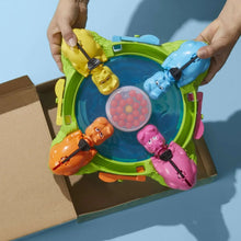 Hungry Hungry Hippos game board in box with toy hippos and marble-catching center