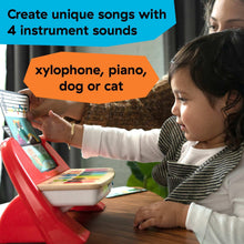 Red baby piano toy with colorful keys and screen showing instrument choices