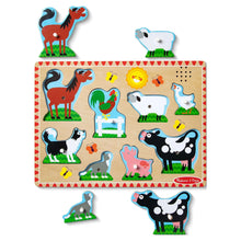 Farm animals sound puzzle board with loose wooden animal pieces and pegs