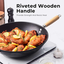 Black wok with riveted wooden handle and two metal rivets on rim