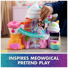 Pastel mountain playset toy with character figure, rainbow-striped slide, and candy pieces