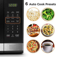 Digital microwave oven control panel with LED display and button keypad, black finish