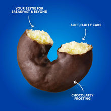 Chocolate-coated frosted mini donut with pale yellow, frosted interior