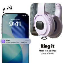 Black Bluetooth tracker clipped to over-ear headphones with a circular button on top