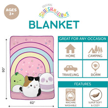 Plush blanket featuring rainbow arcs over a pink field with three animal faces