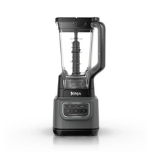 Dark gray countertop blender with clear pitcher and stacked blade assembly inside