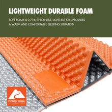 Orange PE sleeping pad foam with raised diamond bumps and fold seam