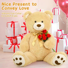 Giant tan teddy bear plush with cream muzzle and gold bow tie