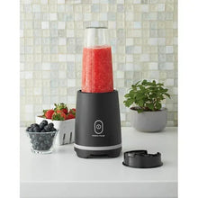 Mainstays black personal blender base with filled clear jar and travel lid