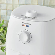Arctic white air fryer top with heating dial and power-heating light