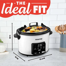 Programmable slow cooker on countertop with lid open, black handles, and food in pot